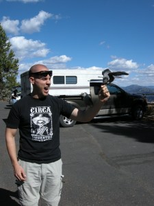 Jamie making friends with a Clark's Netcracker - notice the bird trying to take jamie's finger along with the snack he's holding...