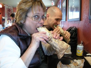 Donna and Jamie take the first bite into beef pita goodness